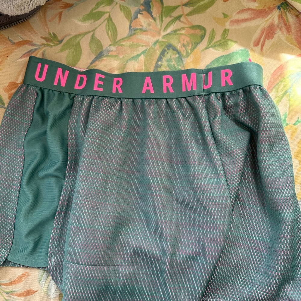 Under Armour grey/pink inside athletic type shorts size cvs women’s